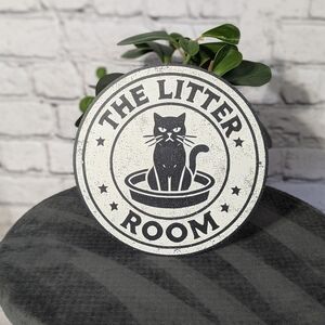 The Litter Room' round metal sign black cat design